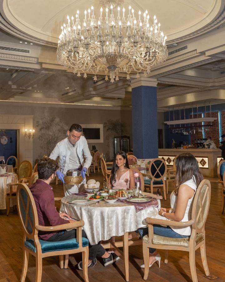 Al Masa Hotel Nasr City Каир Экстерьер фото A restaurant in a hotel