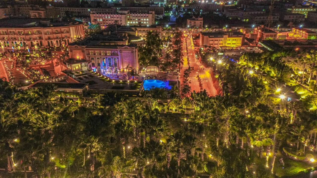 Al Masa Hotel Nasr City Каир Экстерьер фото Aerial view of the resort at night