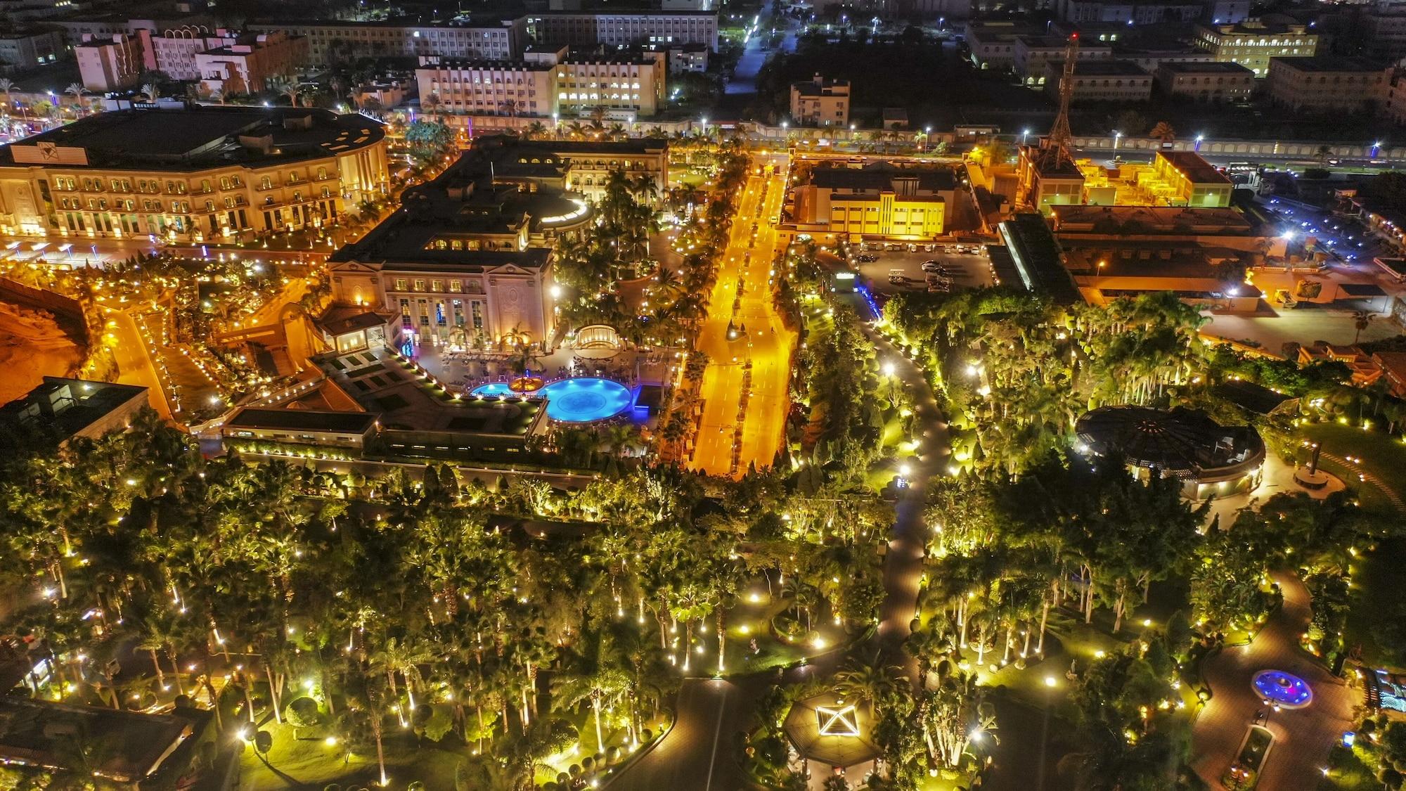 Al Masa Hotel Nasr City Каир Экстерьер фото Aerial view of the resort at night